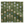 Green pillow featuring repeating star and geometric pattern in white, beige, and blue