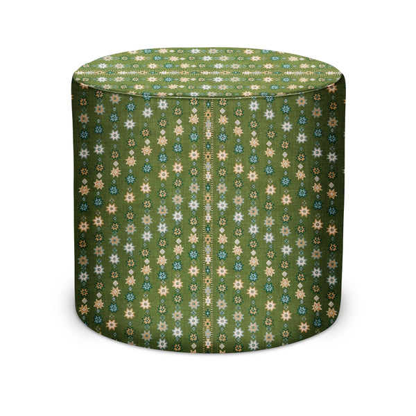 Round indoor pouf with green fabric and multicolor floral geometric pattern, padded top