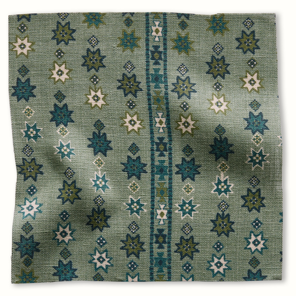 Ocean blue geometric star-pattern pillow cover, woven fabric texture.
