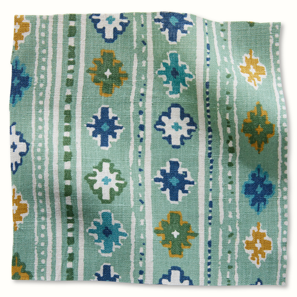 Green pillow cover with indigo and olive geometric jigsaw pattern