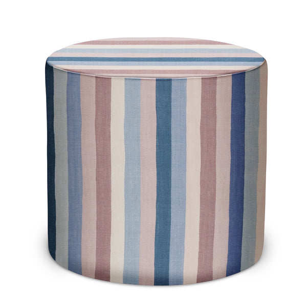 Indoor pouf ottoman in blue and pink vertical striped fabric with round padded top