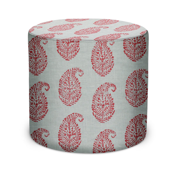 Indoor round pouf with red and cream paisley on light blue fabric