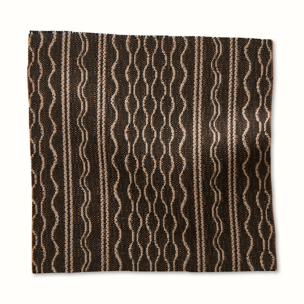 Outdoor pillow with bark-brown Hmong stripe pattern and wavy white lines