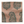 Outdoor pillow in jade and terracotta with geometric floral pattern