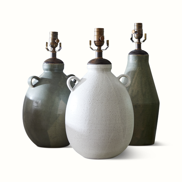 Ceramic table lamp bases: white handled sphere and two dark green vases
