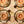 Orange spice jaali salad plate with orange center, white tree motif, and gold rim