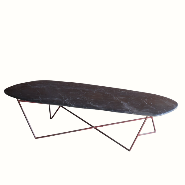 Oval marble-effect coffee table with angled metal legs and dark stone top