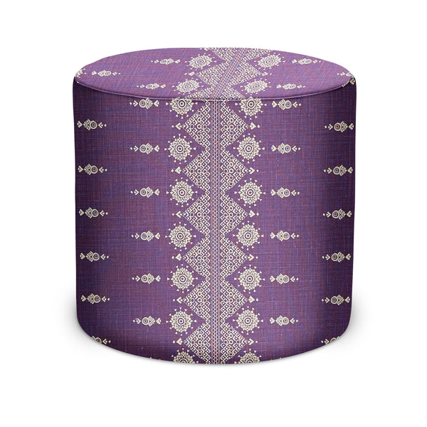 Royal purple round indoor pouf with ornate diamond pattern fabric