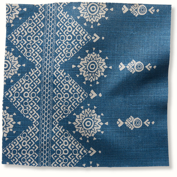 Indigo Carmania geometric pillow front with white patterned motifs and border detail