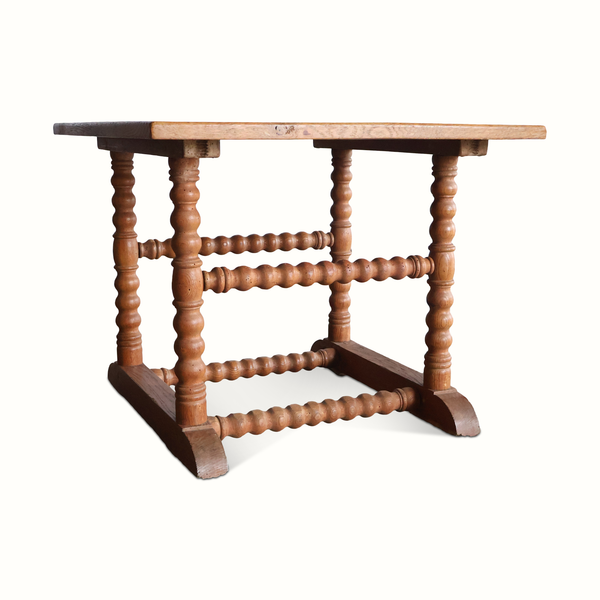 Wooden Dutch-style side table with turned legs and open trestle base
