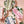 Printed napkins with pink stripe and motif design, plus blue stripe napkin on plates