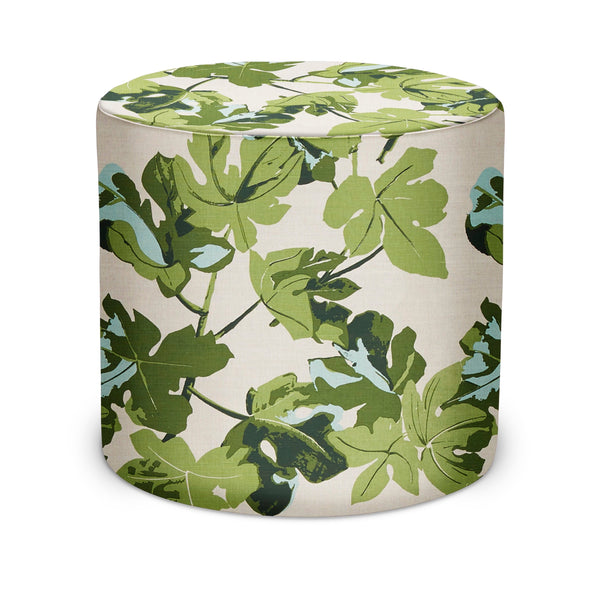 Indoor pouf with round cylinder shape, green fig leaf print on light fabric