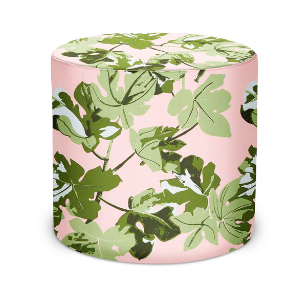 Round indoor pouf with pink base and green fig leaf botanical fabric