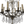 Antique bronze crystal chandelier with candle bulbs and dangling clear prisms