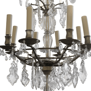 Antique bronze crystal chandelier with candle bulbs and dangling clear prisms