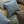 Outdoor Hmong stripe pillow covers in sage and blue tones, stacked