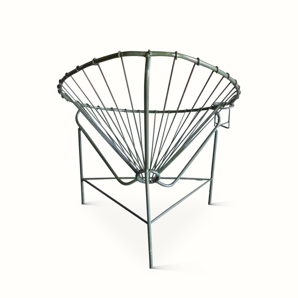 Iron Acapulco chair with rounded green metal frame and black woven back