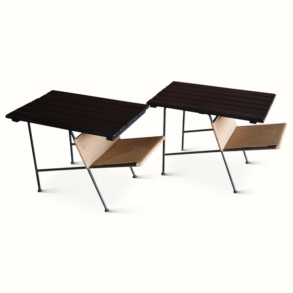 Pair of slat iron side tables with dark slatted tops and brown wicker lower shelves