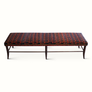 Upholstered bench with rectangular dark upholstered top and Persian red-blue geometric pattern