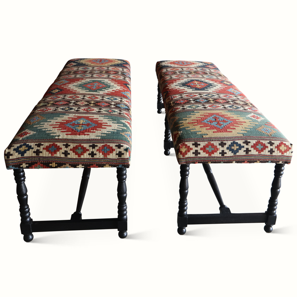 Kilim bench ends with red, navy, and cream geometric woven cushion top