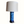Blue Persian pottery table lamp with white fabric shade and dark pedestal base