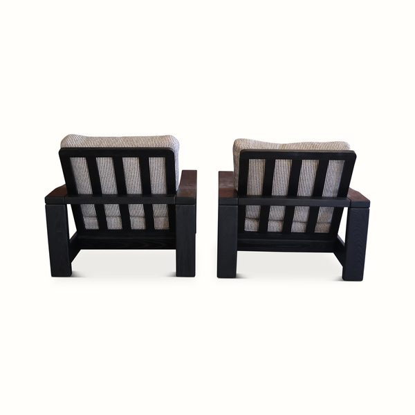 Pair of elm armchairs with vertical slat backrests and striped light blue linen cushions