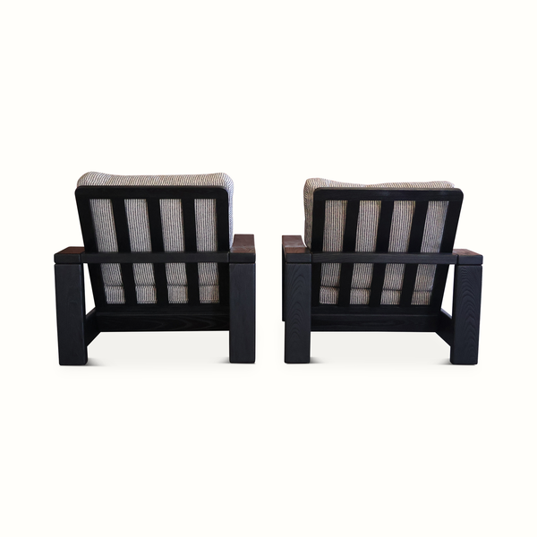 Pair of elm armchairs from the back with dark slat backrests and striped light blue linen