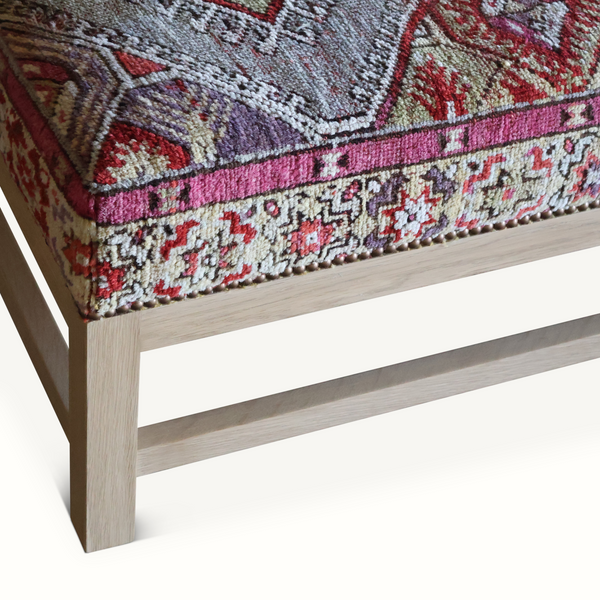 Lexington ottoman side with patterned border upholstery and light wood legs