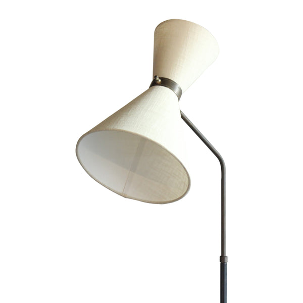 Vintage floor lamp with pivoting cream fabric shade on black metal stem