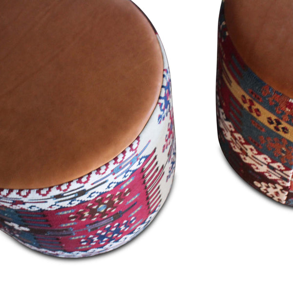 Turkish kilim leather pouf corner view with brown leather top and patterned side