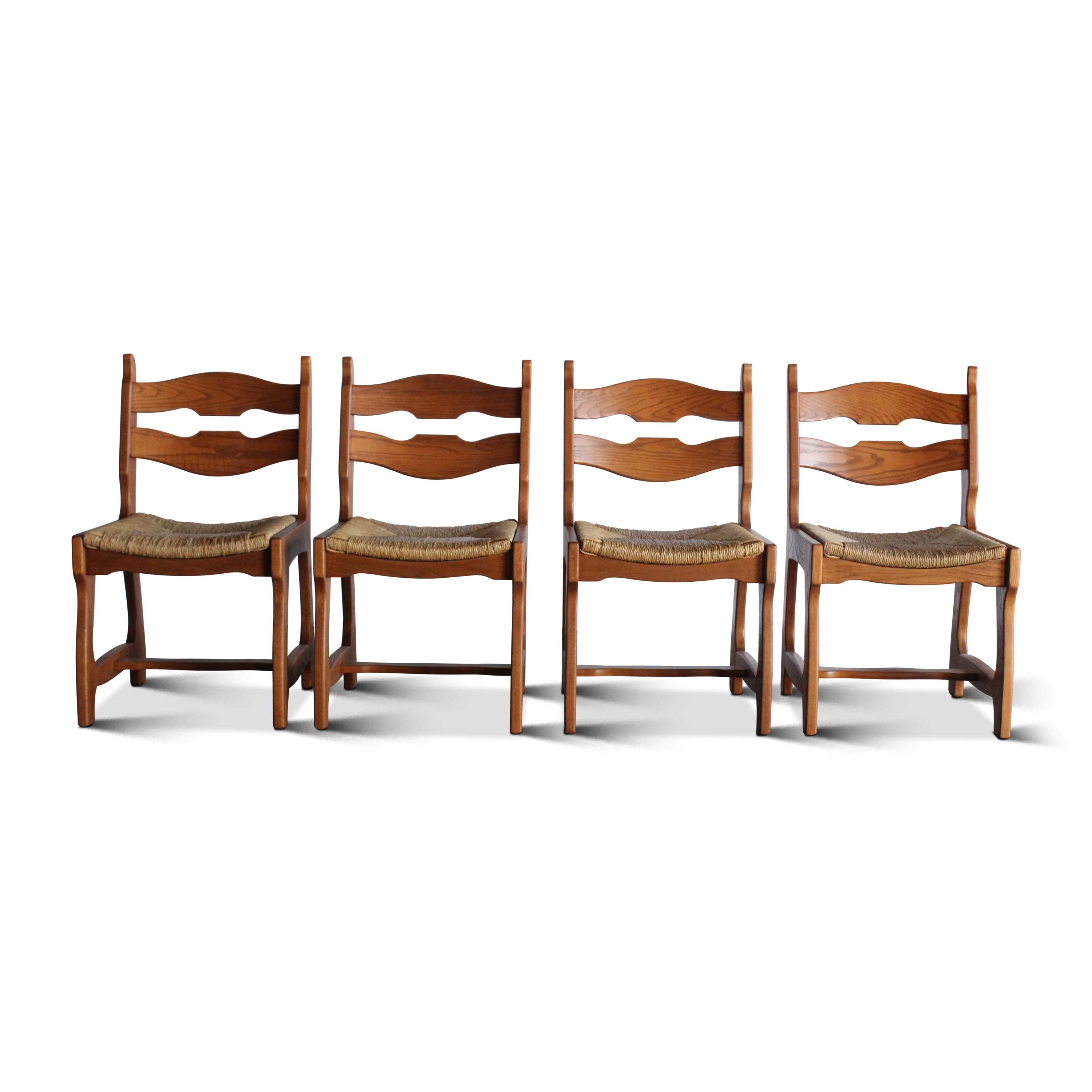 Set of Four Oak and Rush Dining Chairs Attributed to Guillereme et Chambon