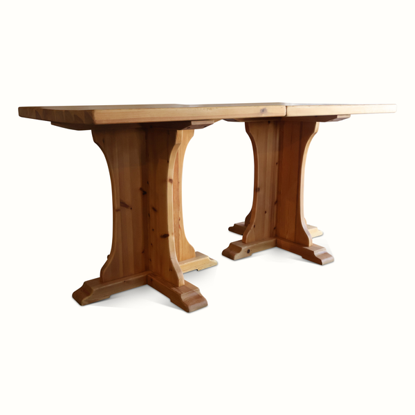 Pine bistro table with square top and double trestle-style pedestal base, light wood.