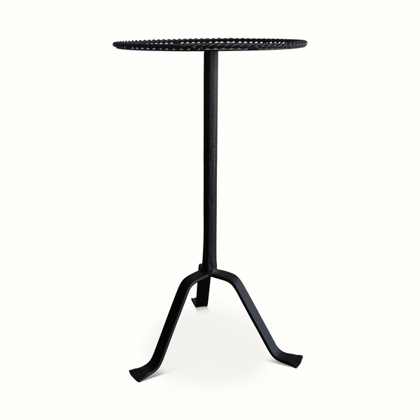 Black gueridon table with braided round top and slender pedestal base