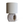 Table lamp with light fabric drum shade and rolled stone base with cutout window