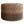 Round upholstered ottoman, beige rug fabric with red and dark blue geometric motifs.