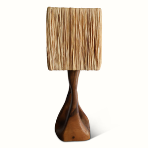 Olive wood table lamp with beige pleated shade and rounded warm-brown sculpted base