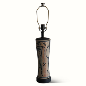 Pottery table lamp with hexagonal lantern-style metal frame and blue abstract ceramic base