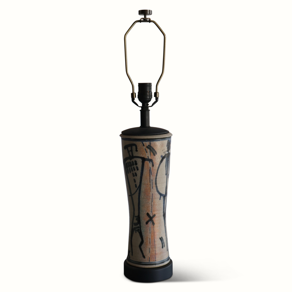 Pottery table lamp with hexagonal lantern-style metal frame and blue abstract ceramic base