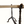 Limestone-topped table with two dark wrought iron legs and round finial brackets