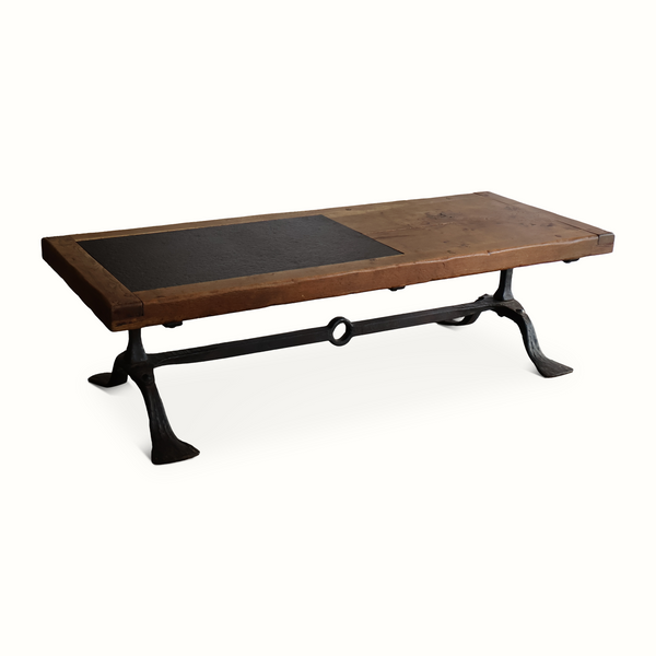 Coffee table with oak top and rectangular slate insert, forged iron legs with ring detail.