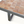 Tile coffee table side view with brown mosaic top and gray metal apron