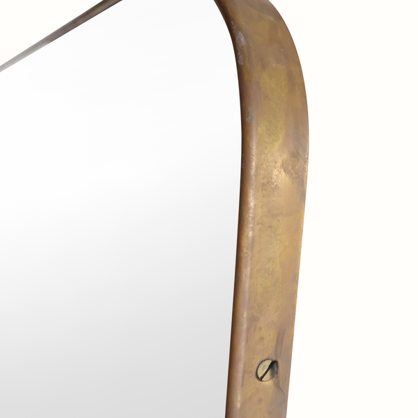 Wall mirror frame edge with hanging loop in brass-toned finish