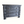 Angled view of four-drawer ebonized oak chest with ornate metal knobs, blue-gray finish