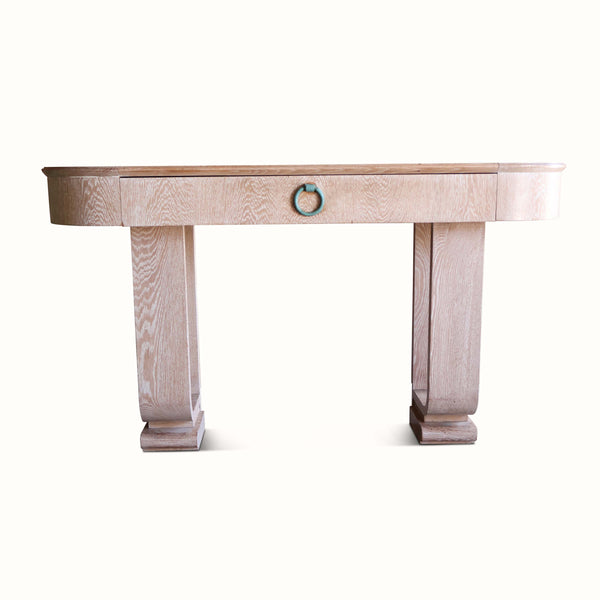 Cerused oak console table with round teal ring pull, wide top and tapered supports