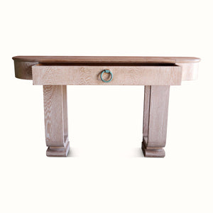 Cerused oak console table with teal ring drawer pull, flared legs and rounded edge