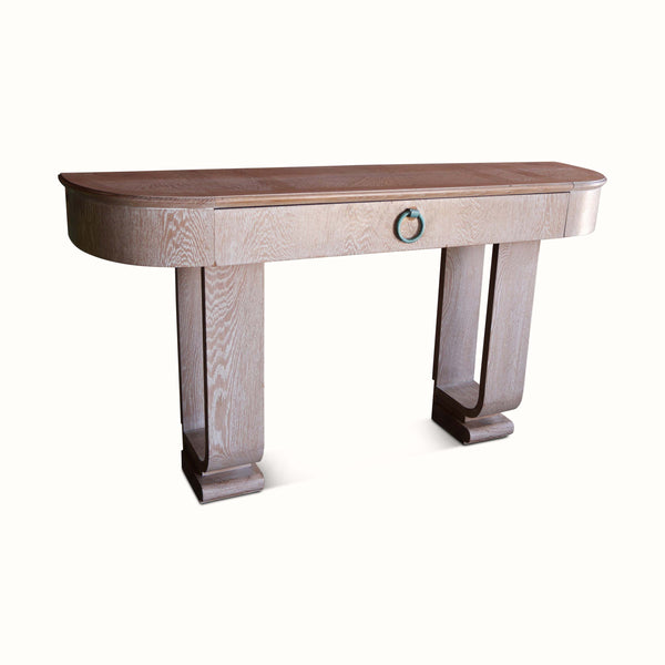 Cerused oak console table with teal ring drawer pull, curved apron and dark tapered legs