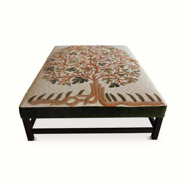 Tree of Life ottoman, beige fabric top with central tree motif and dark wood support frame