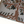 Beige ottoman top cover close-up with detailed tree trunk, leaves, and brown decorative border