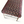 Geometric rug fabric on bench top in red, blue, and cream with patterned border