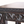 Antique Moroccan table corner with carved geometric trim along the tabletop edge